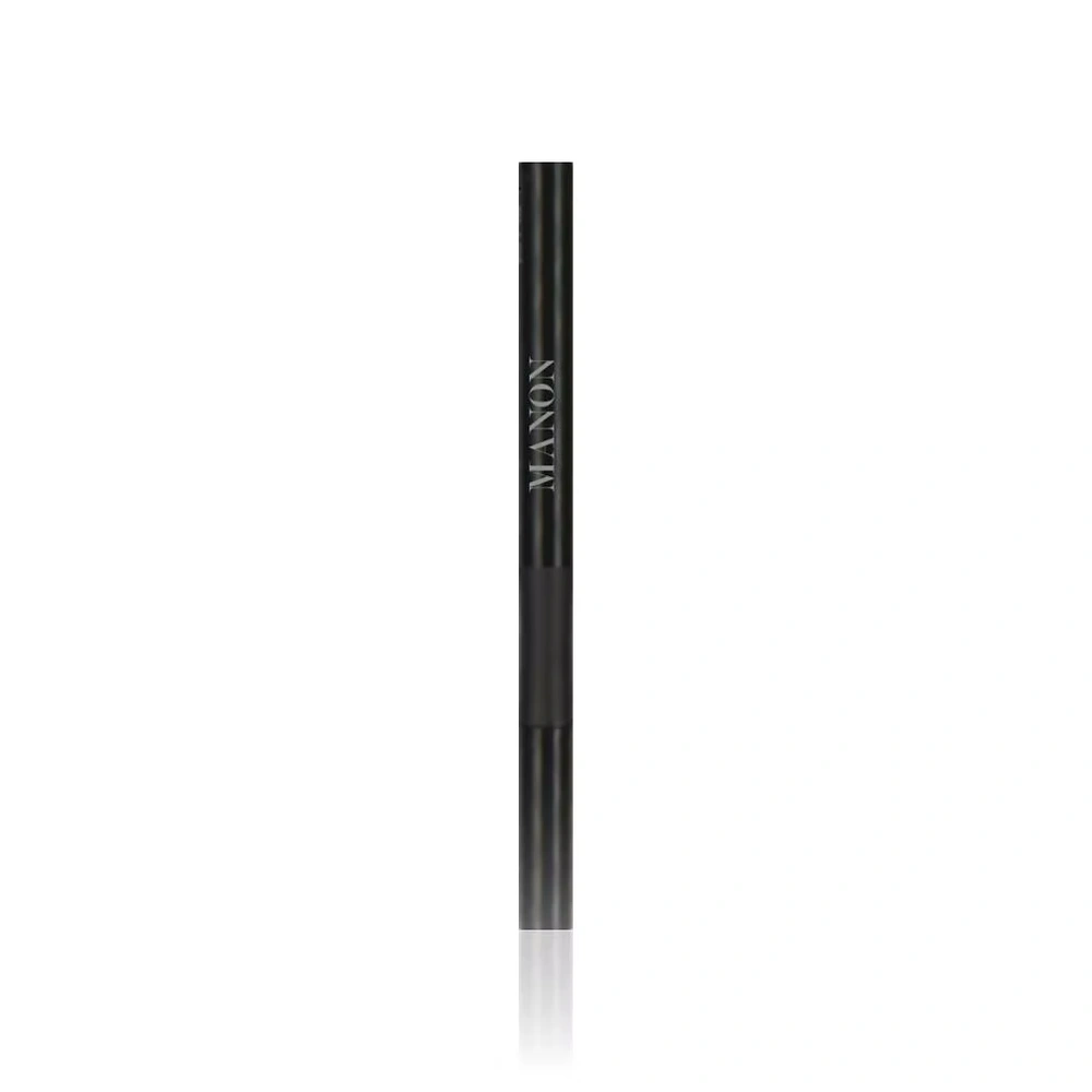 A black felt-tip eyeliner pen, branded "MANON" vertically in silver text, standing centered on a reflective white surface.